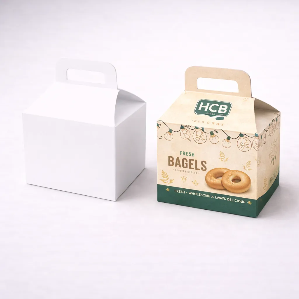Two cardboard gable boxes with handles, showing a plain white version and a decorated bagel box. class=